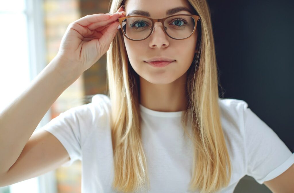 A young woman wearing glasses due to myopia