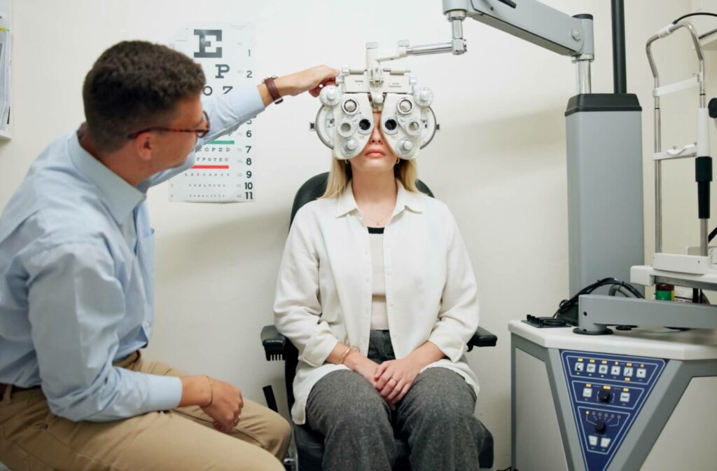 An optometrist evaluates a patient's vision during their routine eye exam.